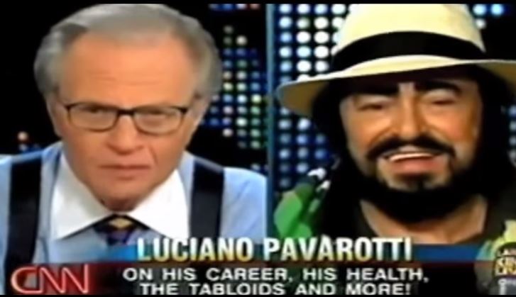 Luciano Pavarotti and Larry King  IN FLYERMALL BY SPYROS PETER GOUDAS