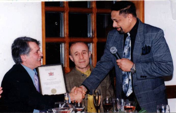 In the photo, starting from the left, are Spyros Peter Goudas, Bill Diamadopoulos - a Radio and Television Personality, and Kenn F.Shah presenting the Award to Spyros Peter Goudas ΣΠΥΡΟΣ ΓΟΥΔΑΣ